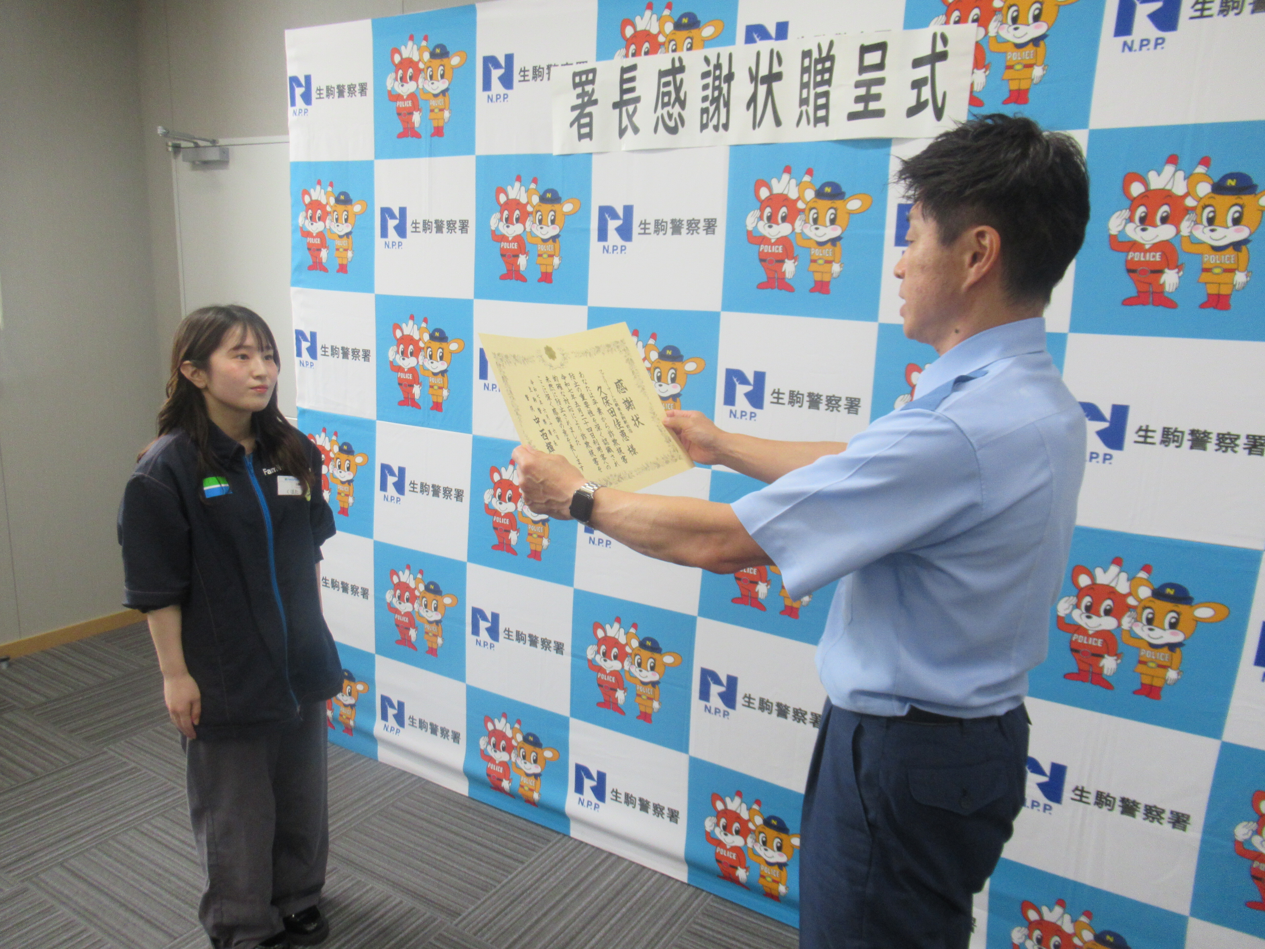 表彰状を読み上げる様子