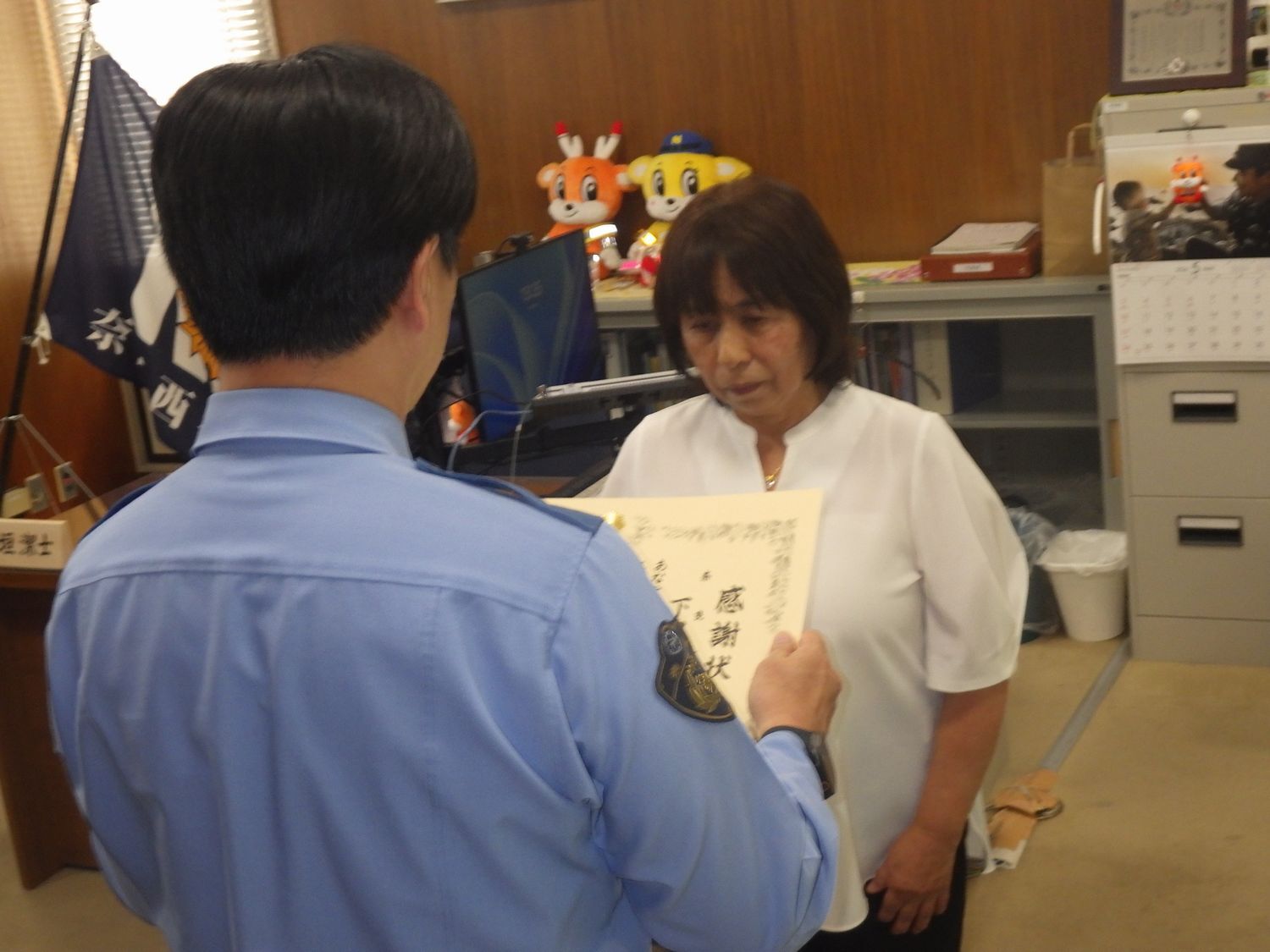 感謝状を読み上げているようす1