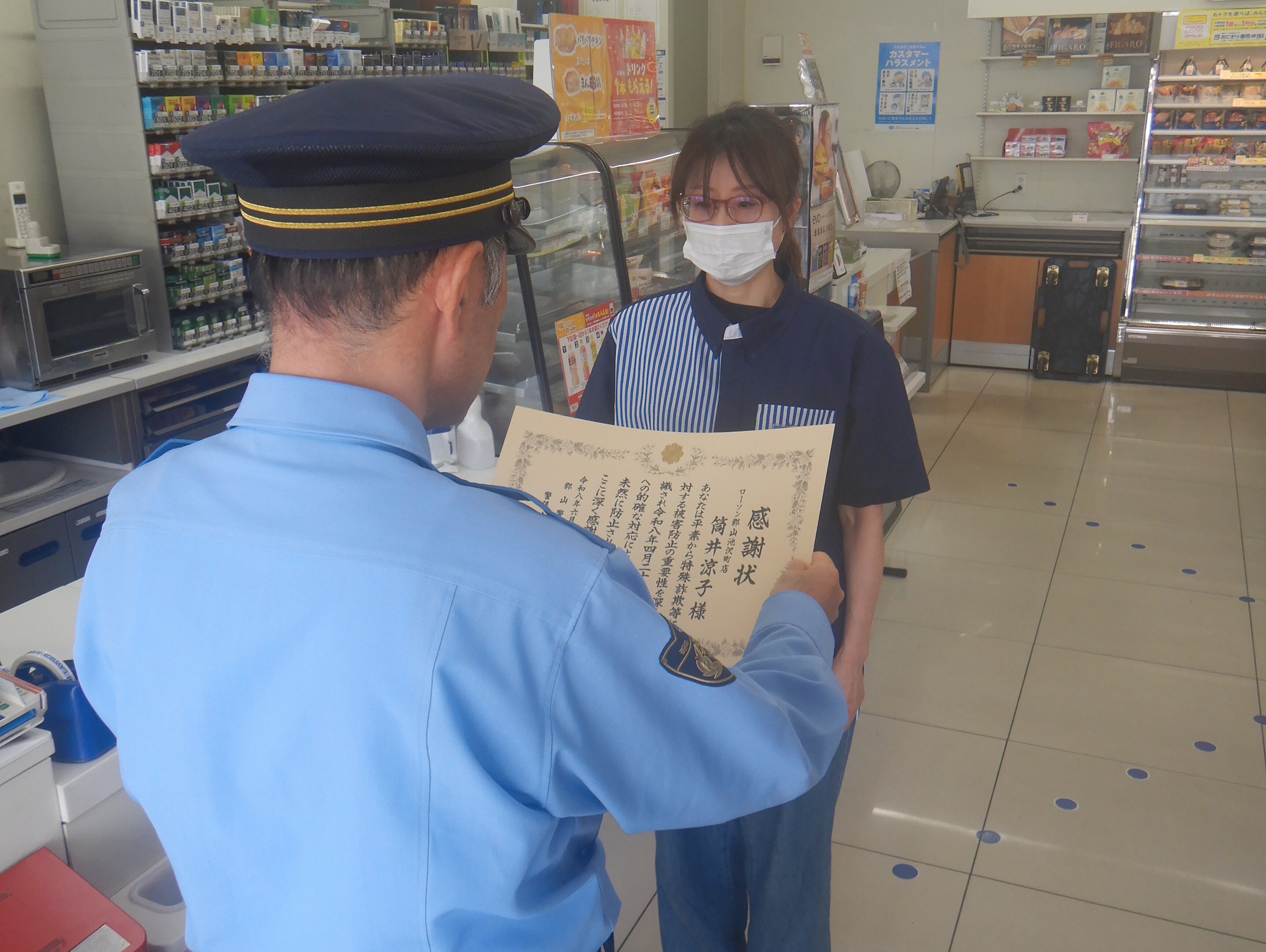 感謝状を読み上げ居ているようす1